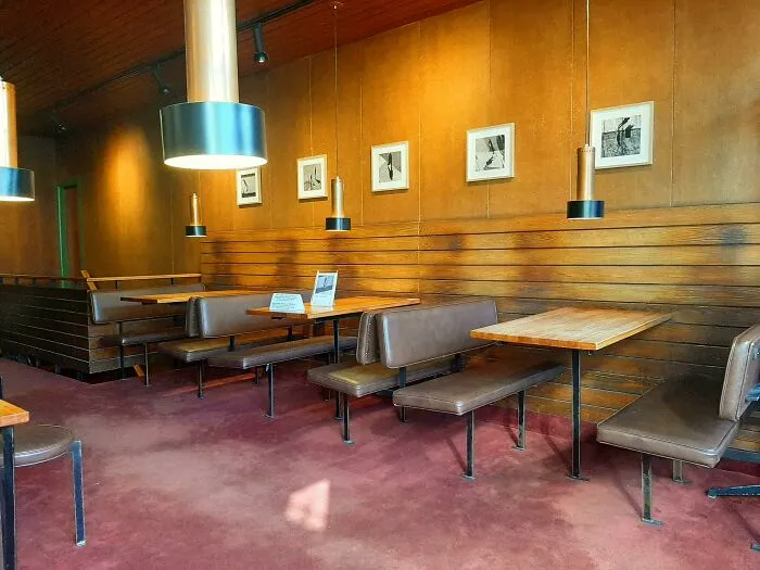 The Walls In This Old Coffeehouse Have Shadows Where People Used To Sit