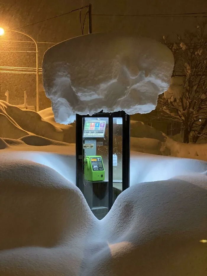 A Phone Box In Snow