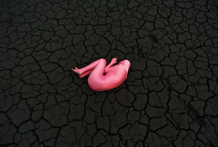 30 Surreal Self-Portraits Wearing Full-Body Suits That Suggest Strangeness, Otherworldliness, And Isolation