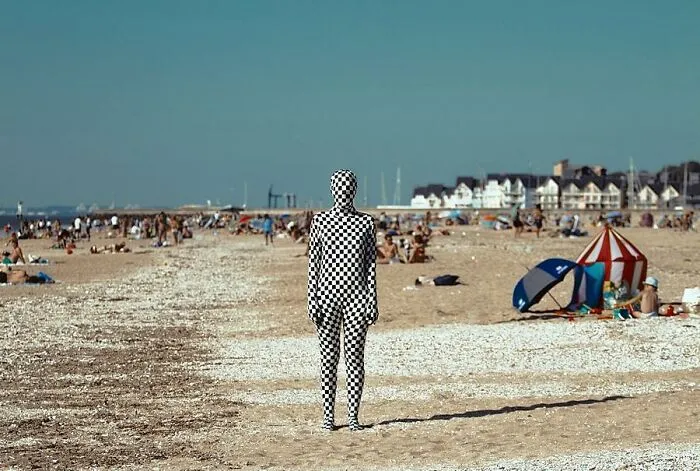 30 Surreal Self-Portraits Wearing Full-Body Suits That Suggest Strangeness, Otherworldliness, And Isolation