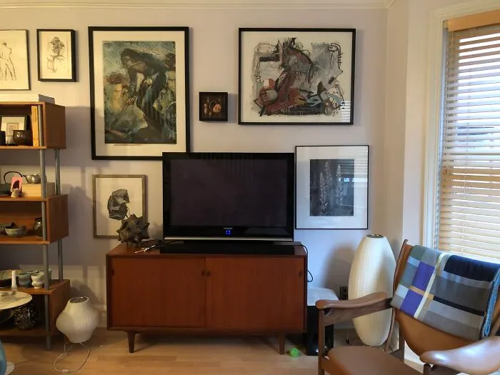 Art. A Lot Of Art. For The Last 35 Years, We've Been Buying Art. This Is One Wall. We Live In A Four Story Town House. The Stairwells Are Full