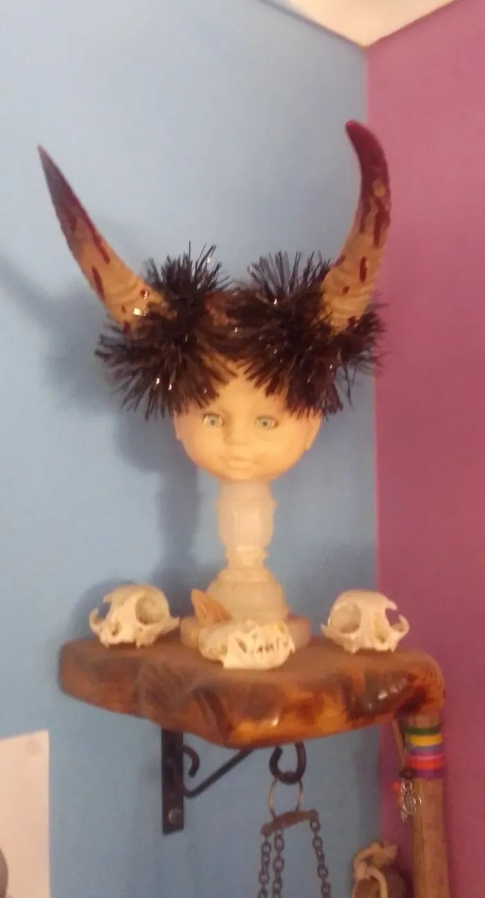 This Doll Head With Real Goat Horns And Real Cat Skulls. Its Our "Angel" We Put On Our Christmas Tree