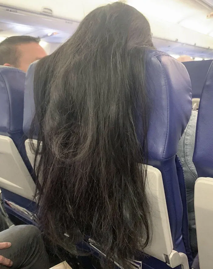 When People Drape Their Hair Over The Backs Of Chairs