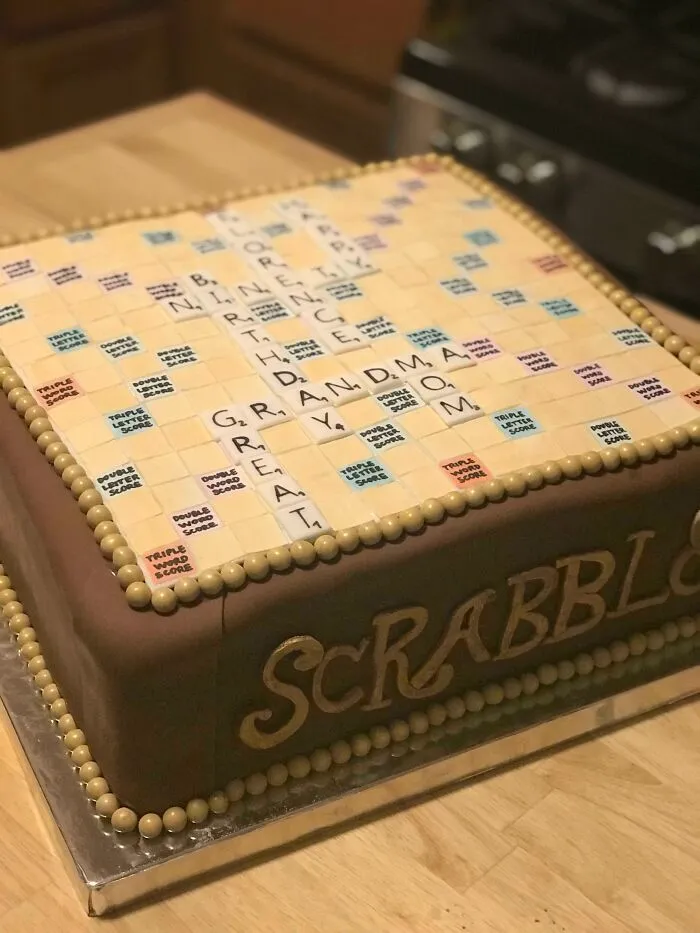 Homemade Vanilla Toffee Scrabble Birthday Cake With Chocolate Buttercream, Caramel, And Banana