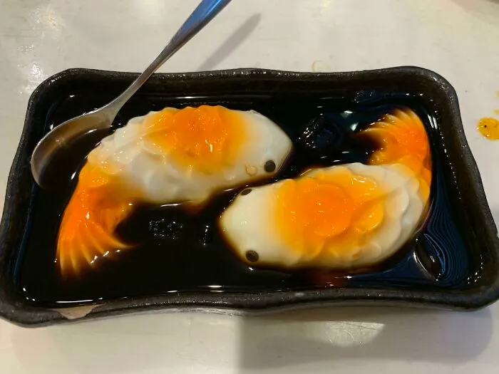Coconut Jelly Koi Fish Swimming In An Espresso Lake