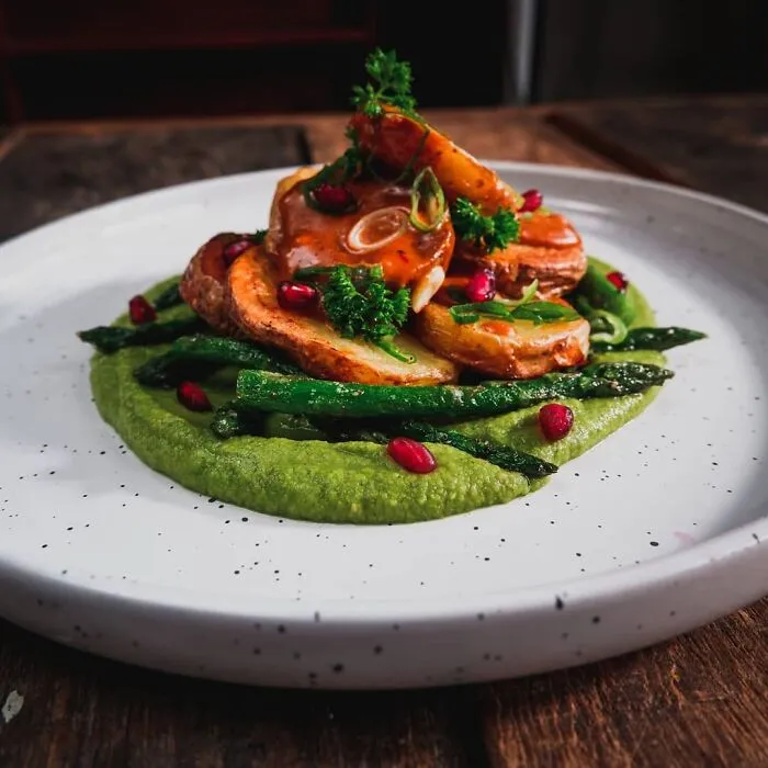 Panfried Potatoes, Asparagus, Pea Puree And A Peanut Sauce