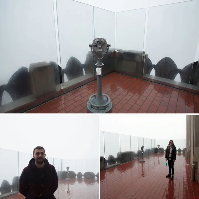 Observation deck with misty view and people showing nature made moments that make people go well that sucks