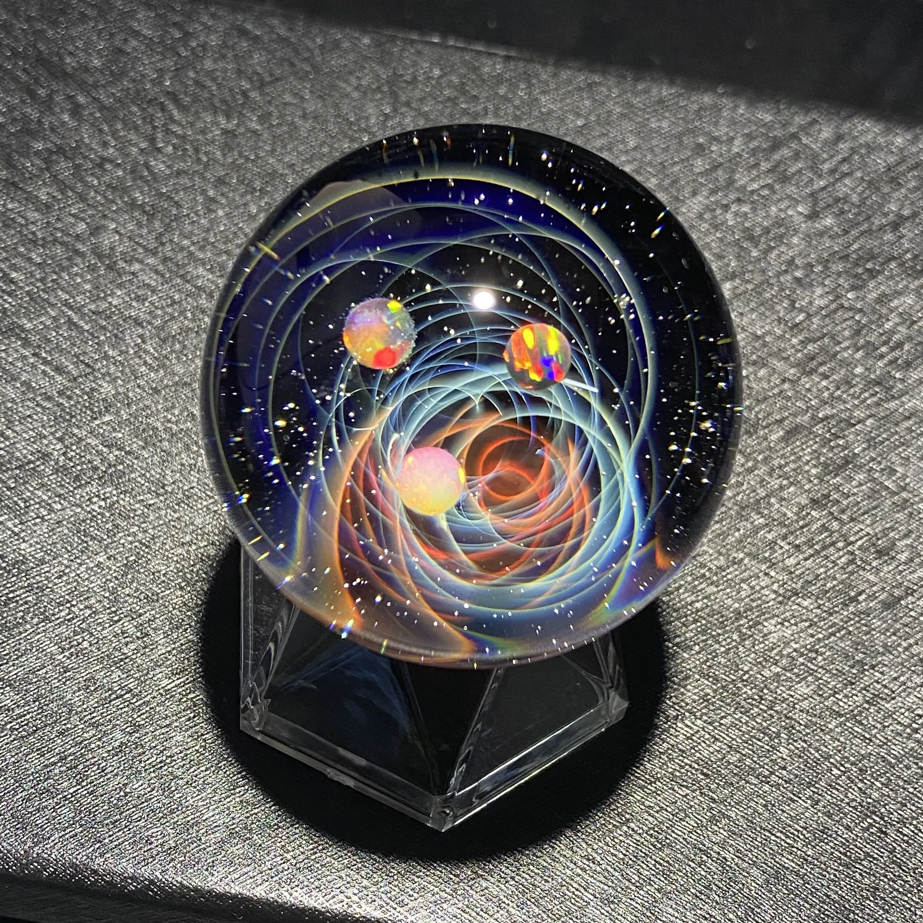 Swirling Galaxy-Inspired Glass Sphere Let You Hold The Entire Universe In Your Hand