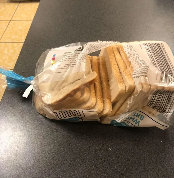 The Caveman Like Way My Co Worker Has Opened His Bread