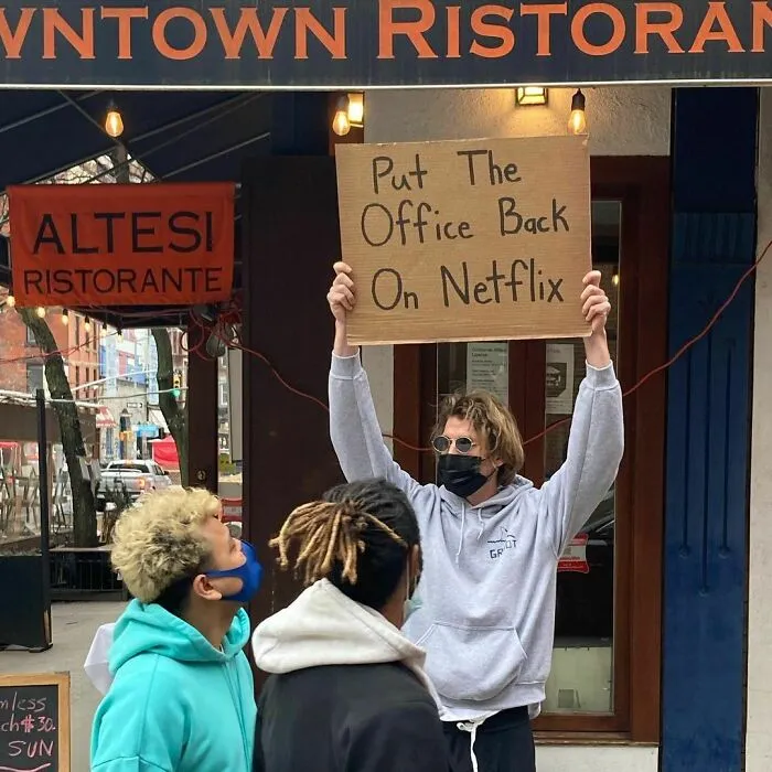 Dude-Holding-Signs-Protesting