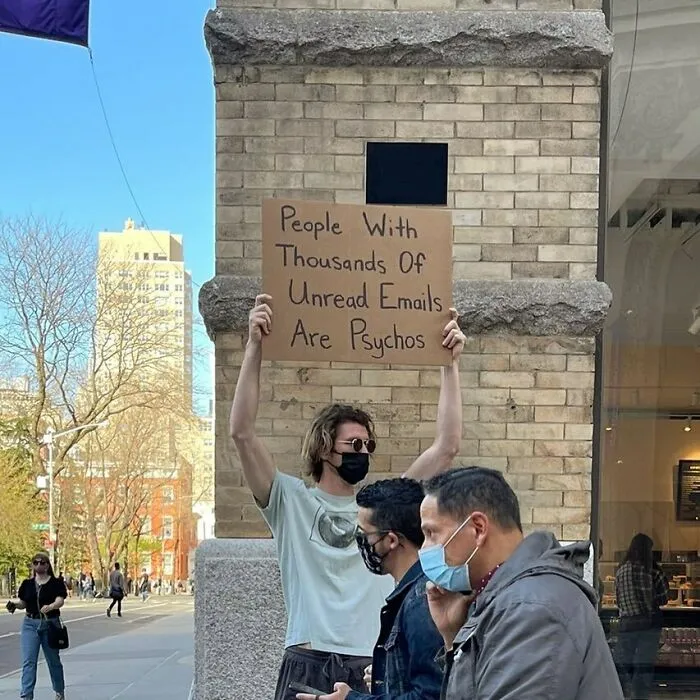 Dude-Holding-Signs-Protesting