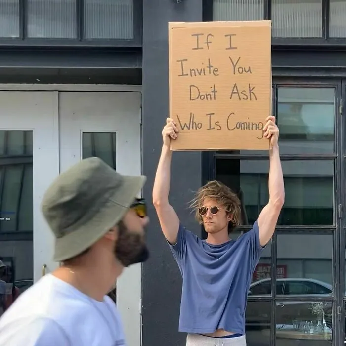 Dude-Holding-Signs-Protesting