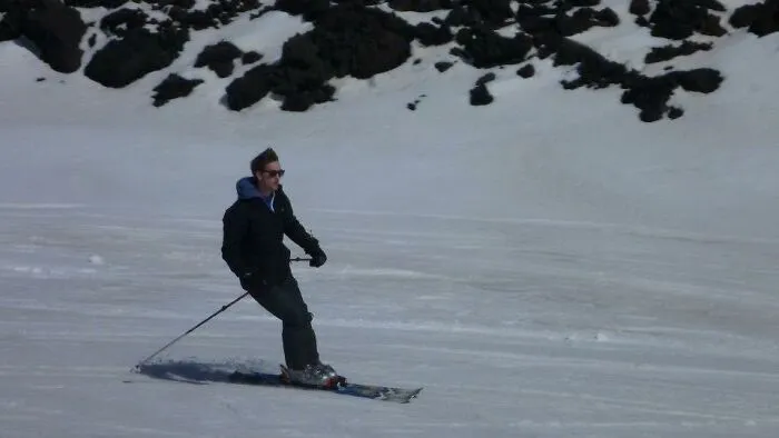 Skiing On Mount Etna In 26 Degrees Celsius Heat With The Snow Melting And The Volcano Erupting