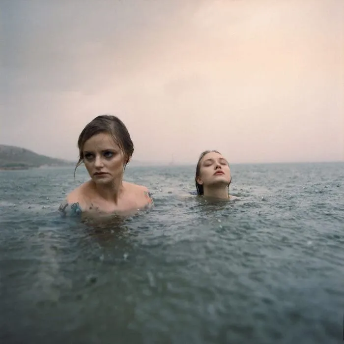 Photographer Uses An Analog Camera To Capture Eerie And Surreal Photos Of People (30 Pics)