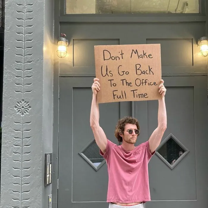 Dude-Holding-Signs-Protesting