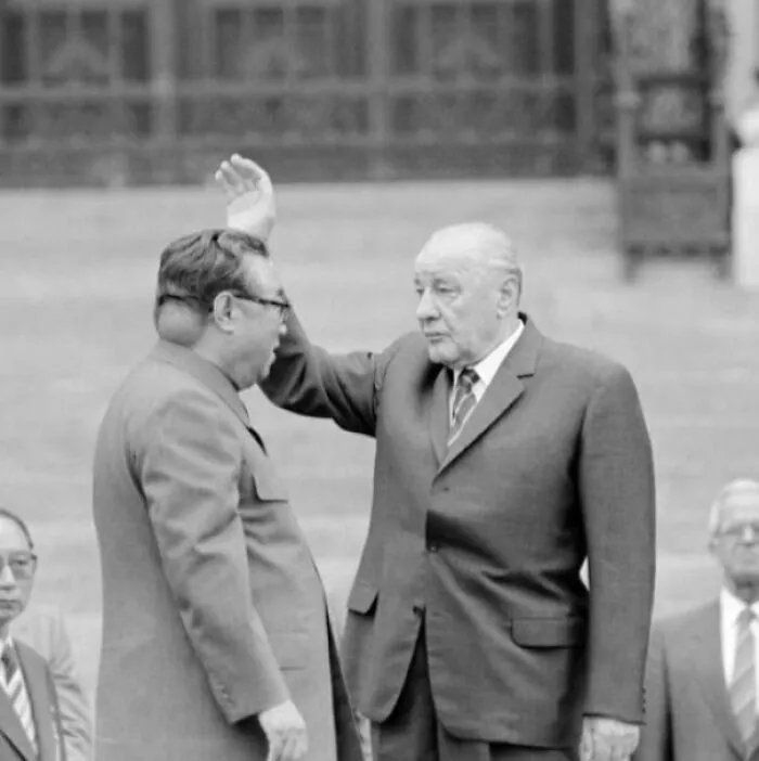 North Korean Founder Kim-Il Sung Had A Baseball Sized Tumor On The Back Of His Head. North Korean Propaganda Officials Had All Photos Taken Of Him From The Left Side. This Is One Of The Few Candid Photos Of The Tumor