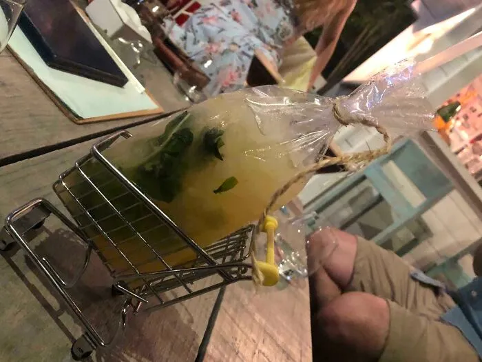 My Mojito Just Arrived In A Plastic Bag. In A Small Trolley. Smh