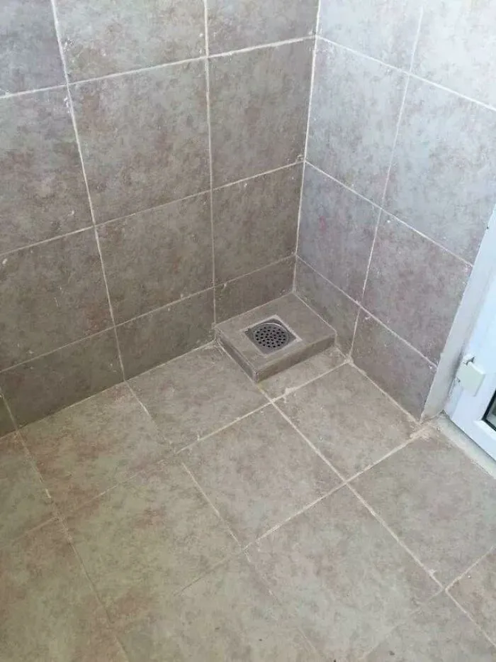 It’s Either A Very Unusable Shower Or An Uncommon Urinal