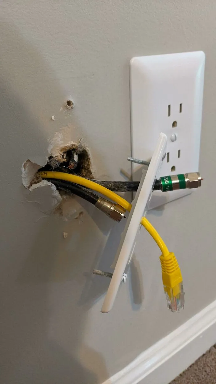 I Can't Decide Whether To Be Pissed Off Or Impressed At The Fact That They Managed To Use Machine Screws In Drywall Without A Box Frame Or Ancors