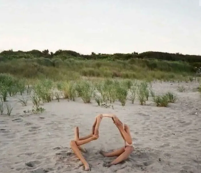 Just Two Persons Holding A Mirror