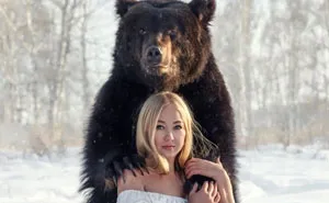 Russian Woman Rescued A Bear From A Closed-Down Zoo, And They're Best Buddies Now