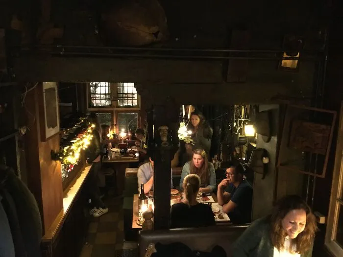 In 'T Goede Uur: A Wine, Cheese And Fondue Restaurant, Lit Almost Solely By Candlelight In A Very Old Building In Haarlem, Netherlands