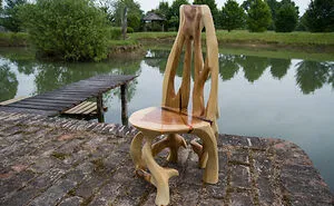 Inovative Furniture Design Or Artistic Masterpiece? These Artists Create Amazing Functional Sculptures Out Of Single Trunk By Chainsaw Carving!