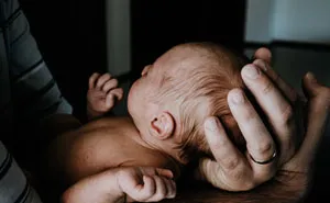 Dad Of 3 Girls Shows A Moment Of Disappointment When His 4th Daughter Is Born - His Mother Calls Him 'Misogynistic'