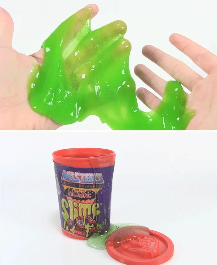 Green slime from '80s toy collection, with hands and Masters of the Universe container.
