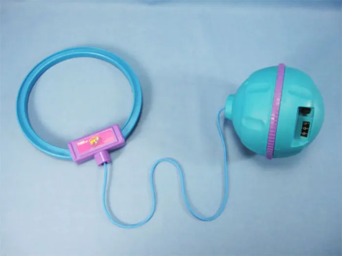 Retro '90s toy Skip-It with a blue ankle loop and attached counter ball.