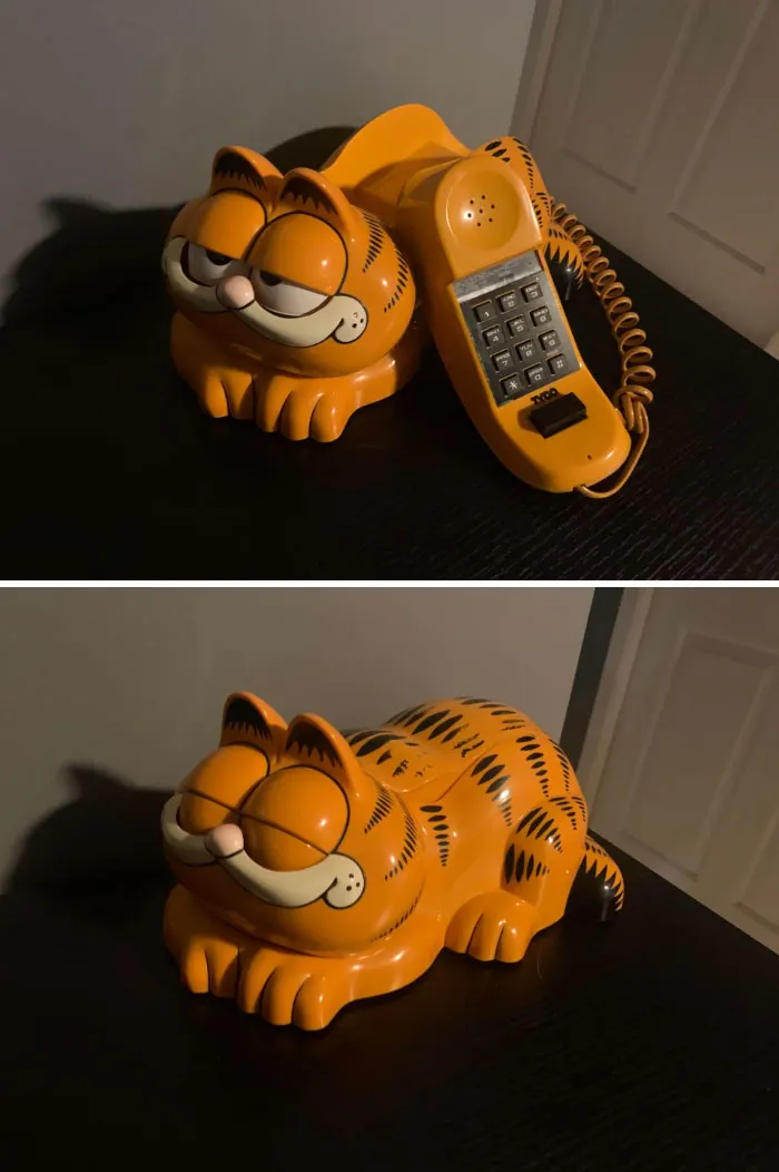 Garfield phone from '80s, vintage telephone shaped like the famous cartoon cat, smiling with handset on top.