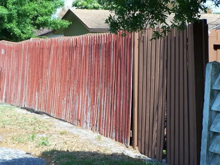 very high wooden fence