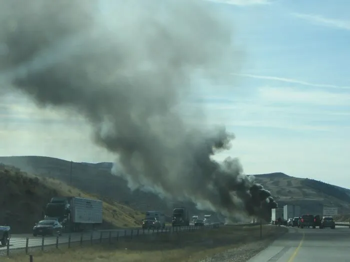 I-84, Se Of Ogden, Ut, 2018.  Semi Truck Loaded With Rough Sawed Timbers Caught Fire Just Ahead Of Me