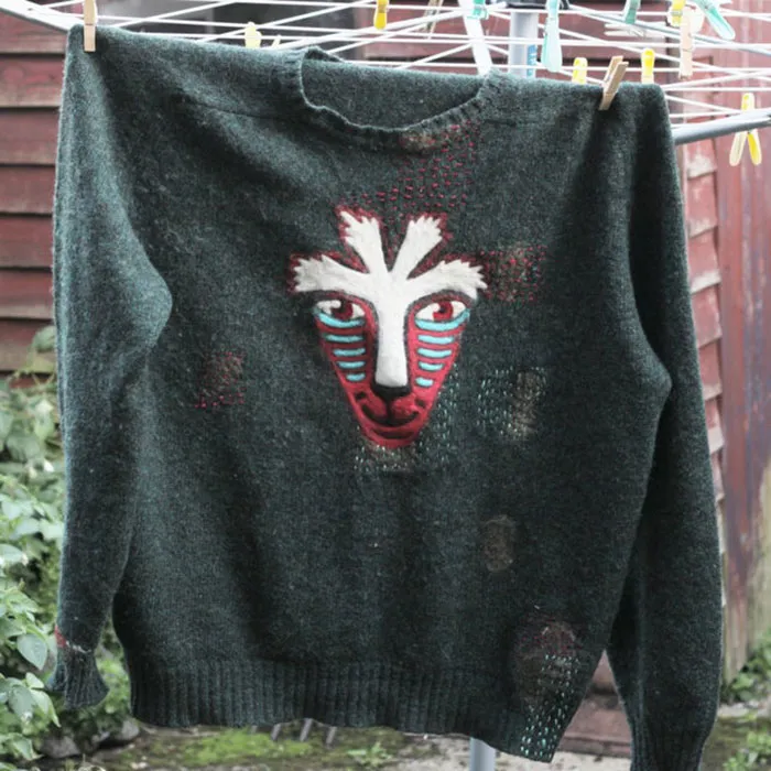 An Incredibly Moth Eaten Jumper I Needle Felted The Face Of The Forest Spirit From Princess Mononoke Over. Also, If You Look Closely, You Can See I Did Lots Of Smaller, Less Ambitious Repairs Using Felt And Thread To The Rest