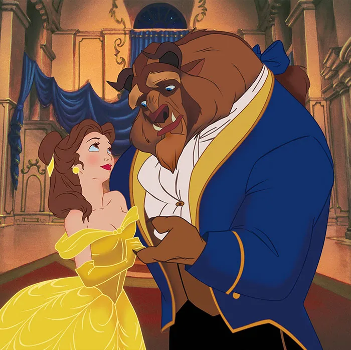 Beauty and The Beast looking at each other in a castle