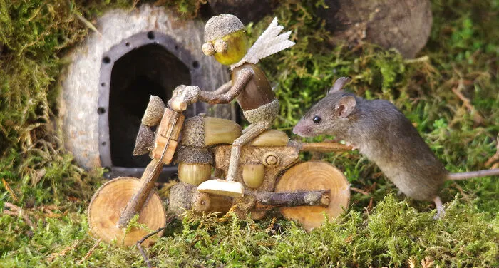 One Of The Mice Giving Mr. Acorn A Push Start On His Motorcycle
