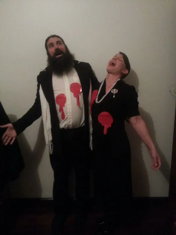 Need To Go To A Batman Themed Dress-Up Party On A Budget? Go As His Parents. Cost: 2 Sheets Of Paper