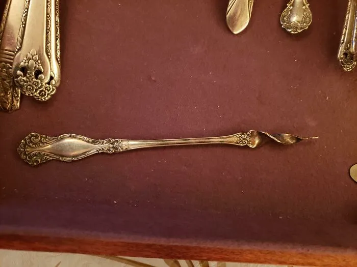 Part Of Silverware Set. It Has A Corkscrew Tip, But It Is Not Sturdy Enough To Be Used As S Corkscrew. Thoughts For Its Purpose?