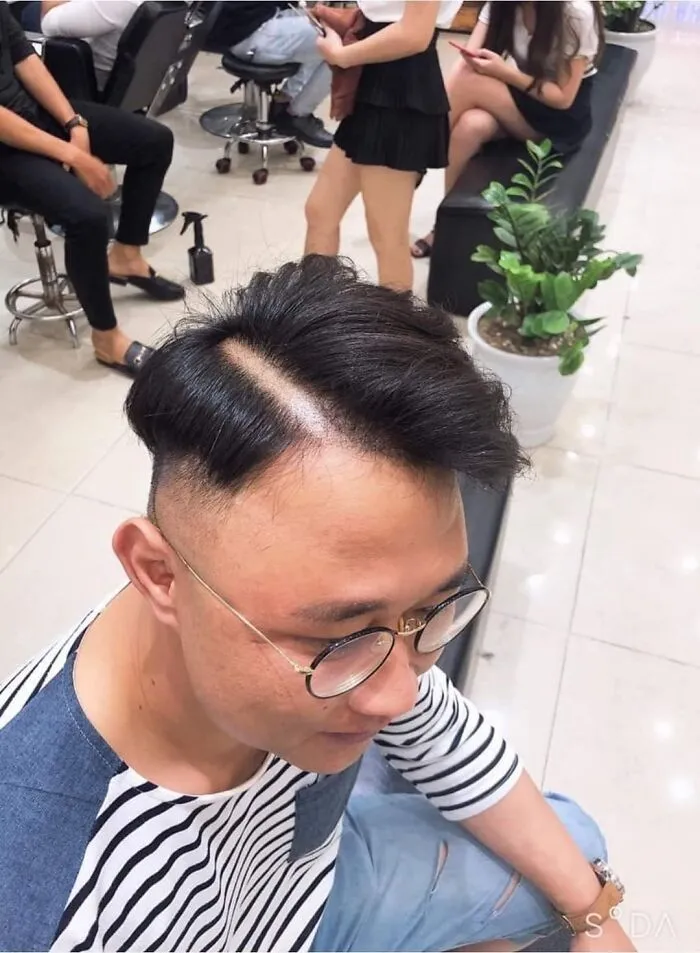 Comb Over With A Hard Part... Like 'Moses Parting The Red Sea' Hard