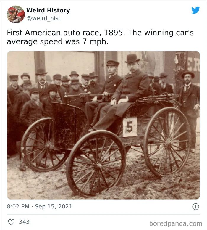 Vintage photo of the first American auto race in 1895 with spectators, showcasing early weird history and trivia facts.