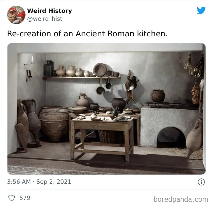 Re-creation of an Ancient Roman kitchen with pottery and cooking tools, showcasing weird history facts and trivia for history lovers.