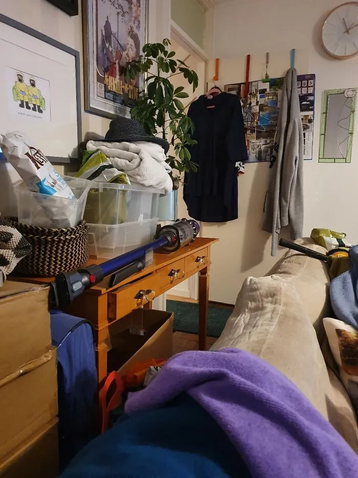 The Pile Of Stuff Behind Me Sofa That One Day Ill Deal With. Includes My Big Bertha Golf Club.