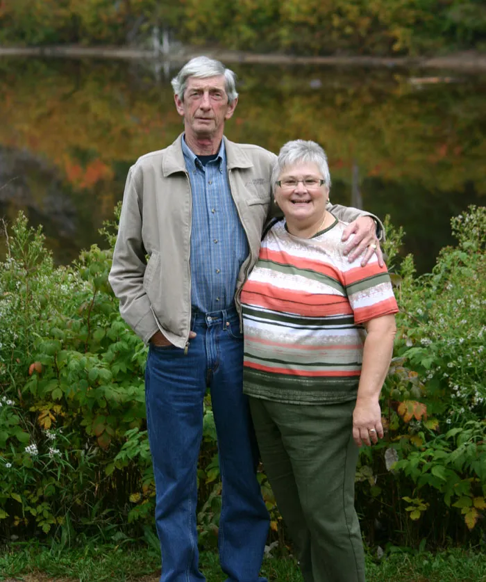 Man and woman standing next to each other
