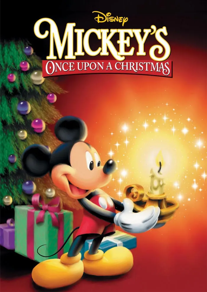 Mickey Mouse holding a candle with a decorated Christmas tree and gifts in the background, highlighting best Christmas movies theme.