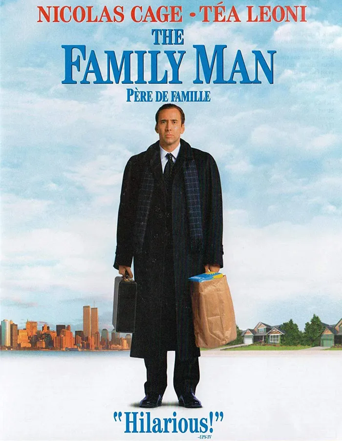 Cover of "The Family Man" with city skyline, featuring a man in a suit holding groceries, related to best Christmas movies.