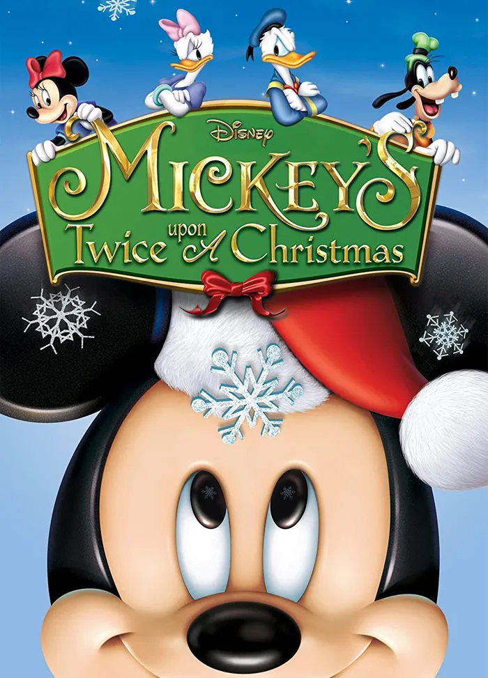 Cover of "Mickey's Twice Upon a Christmas" featuring Mickey Mouse in a Santa hat.