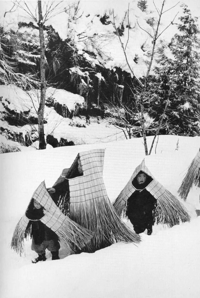 Children In A Traditional Minobashi Raincoat Going To A New Year's Event, Niigata Prefecture, Japan, 1956