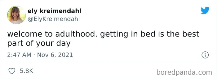 Tweet from Ely Kreimendahl humorously describing adulthood as getting in bed being the best part of your day, funny meme content.