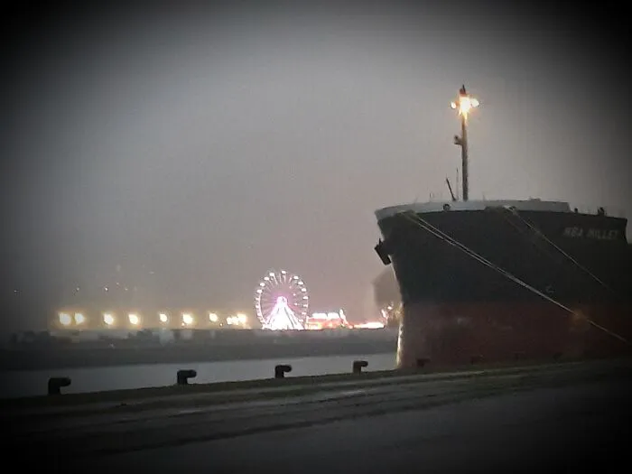 I Work On The Pot On Rouen, France And The Fun Fair Settled On The Other Bank Which LED To An Eerie, November-Evening Picture