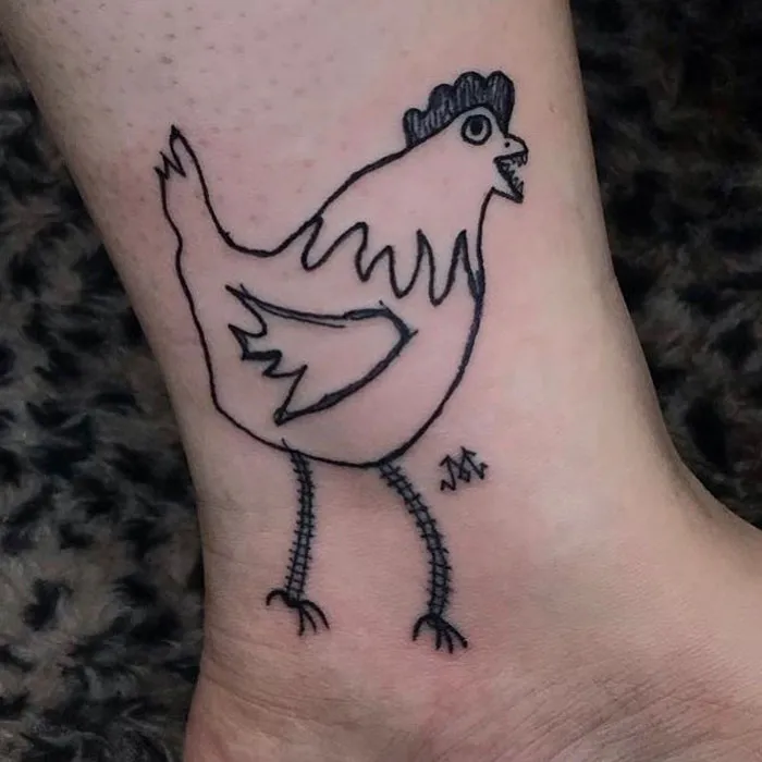 Simple chicken tattoo by a tattoo artist known for unique designs, showcasing humorous and charming art.